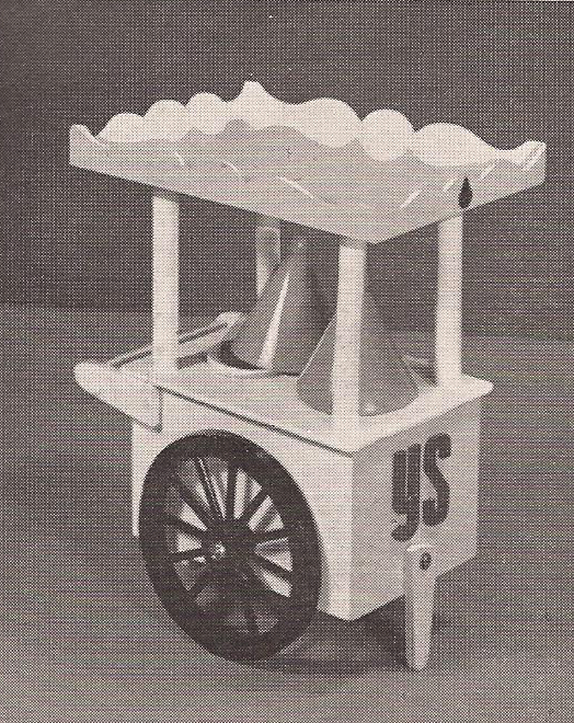 Een IJscowagentje met twee keramische dekseltjes, ontworpen door Pieter van Gelder